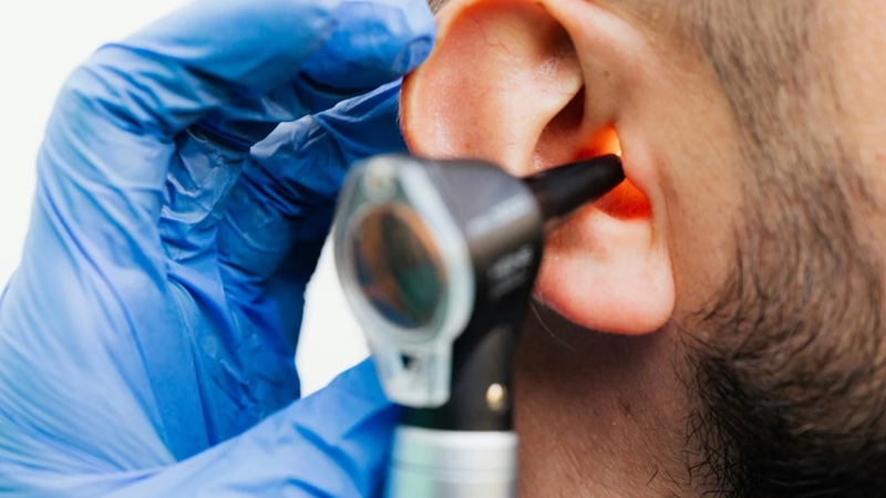 Photo of ear being assessed